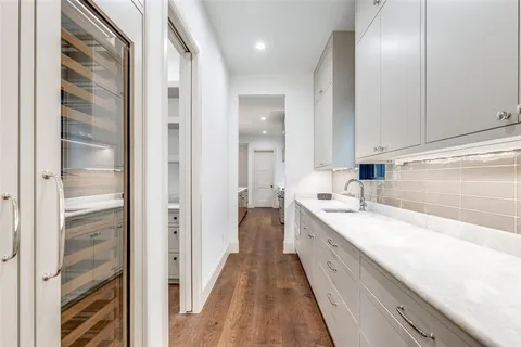a bathroom with a bathtub and shower
