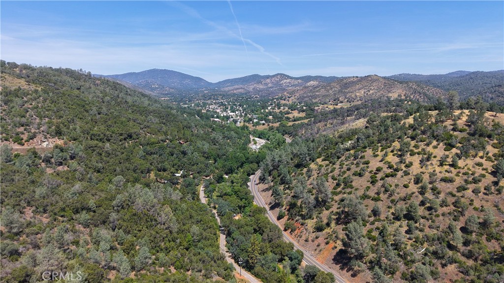 10 Miller Road Mariposa, CA 95338 - Photo 14 of 34 an aerial view of mountain with residential houses and mountain in the background