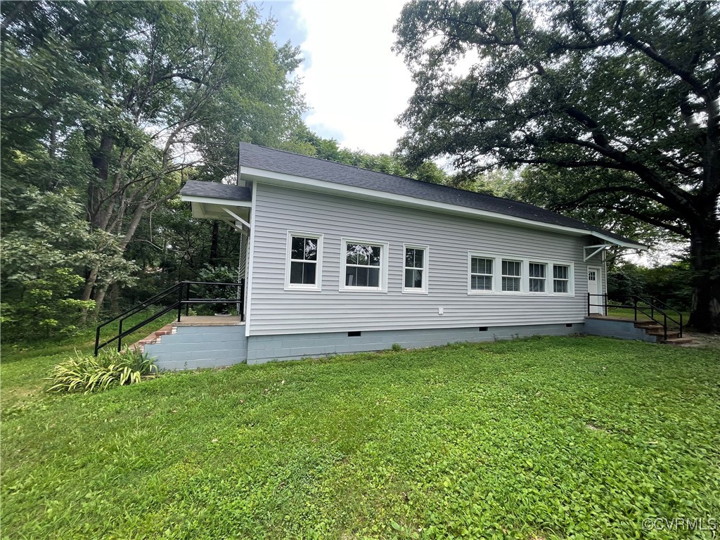 2809 Sandy Hook Road Goochland, VA 23063 - Photo 5 of 18 a view of a house with a yard