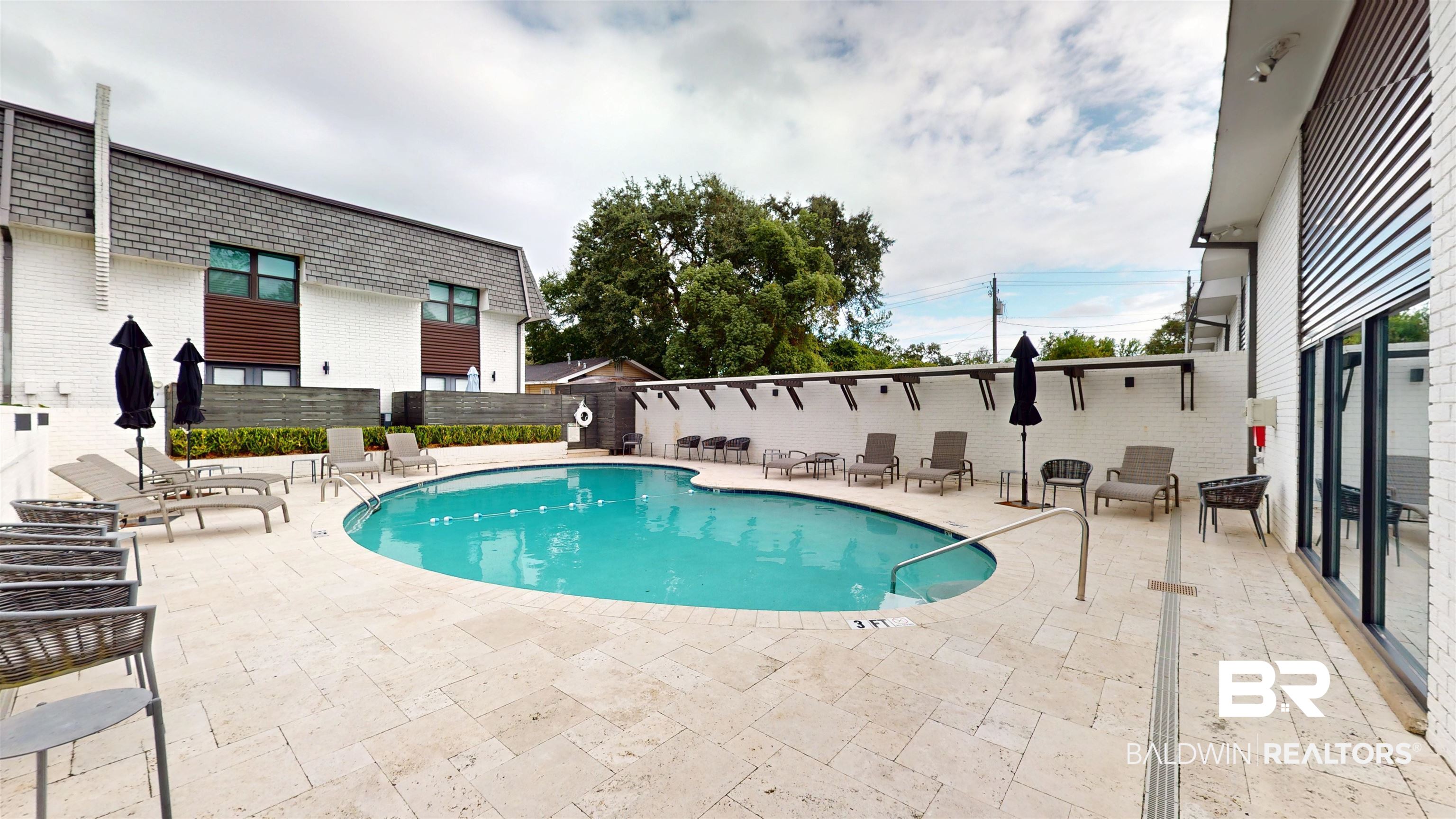3655 Old Shell Road, Unit 219 Mobile, AL 36608 - Photo 15 of 25 Community pool with a patio