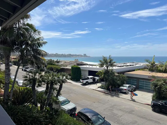 a view of house with outdoor space and street view