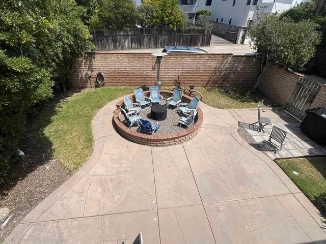 a view of balcony with wooden floor