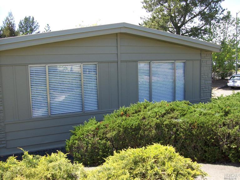38 Shadyleaf Court, Unit 38 Santa Rosa, CA 95409 - Photo 1 of 1 a front view of a house with a yard