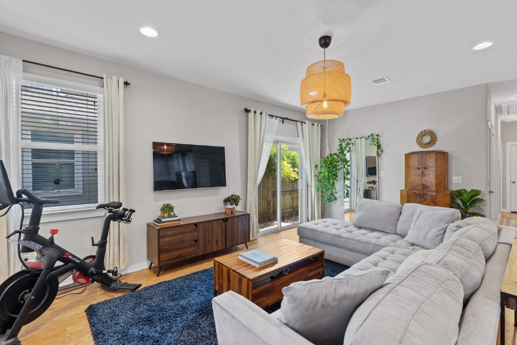 5317 Daimler Drive Austin, TX 78744 - Photo 1 of 1 a living room with furniture and a flat screen tv