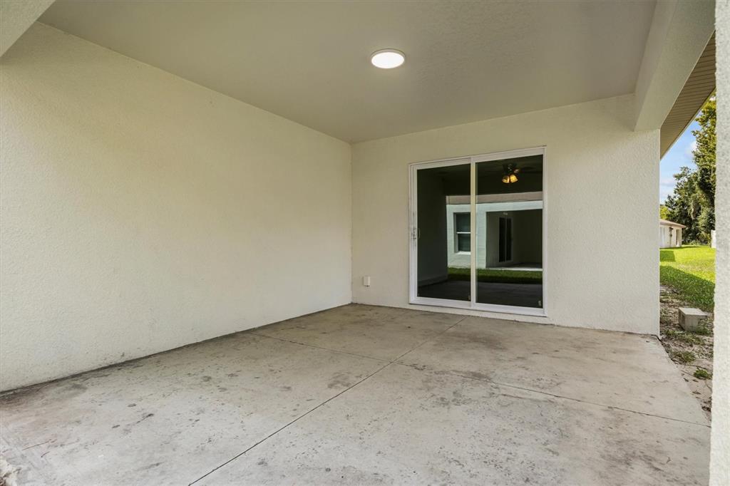 4078 Oak Loop Mulberry, FL 33860 - Photo 12 of 19 a view of an empty room with a window