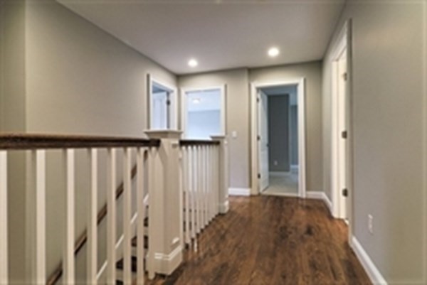 38 F Hiley Brook Road Stow, MA 01775 - Photo 13 of 26 a view of a hallway with wooden floor