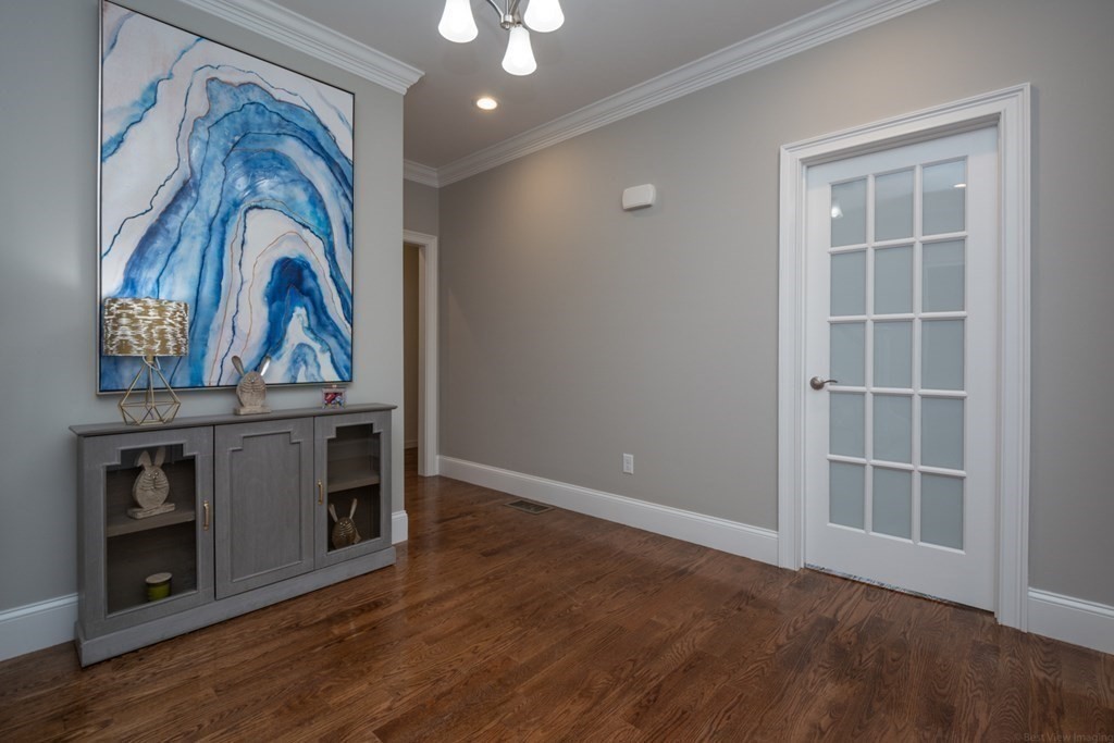 38 F Hiley Brook Road Stow, MA 01775 - Photo 4 of 26 a view of a livingroom with a fireplace and wooden floor
