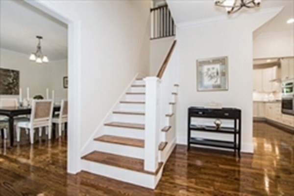 38 F Hiley Brook Road Stow, MA 01775 - Photo 6 of 26 a view of entryway and hall with wooden floor