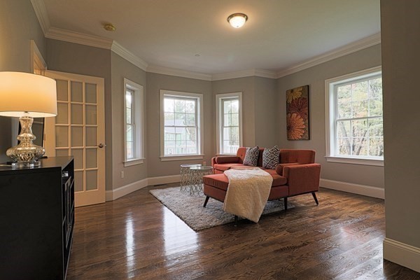 38 F Hiley Brook Road Stow, MA 01775 - Photo 10 of 26 a bedroom with furniture and wooden floor