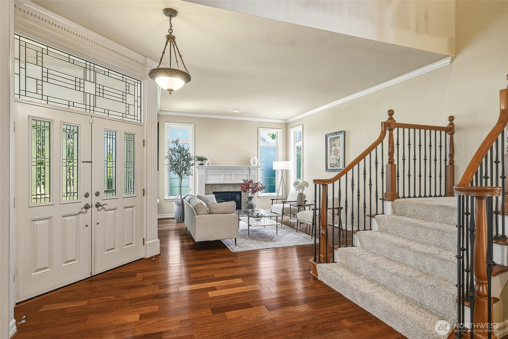 3932 221st Place Southeast Bothell, WA 98021 - Photo 6 of 36 a view of a livingroom with furniture wooden floor and windows