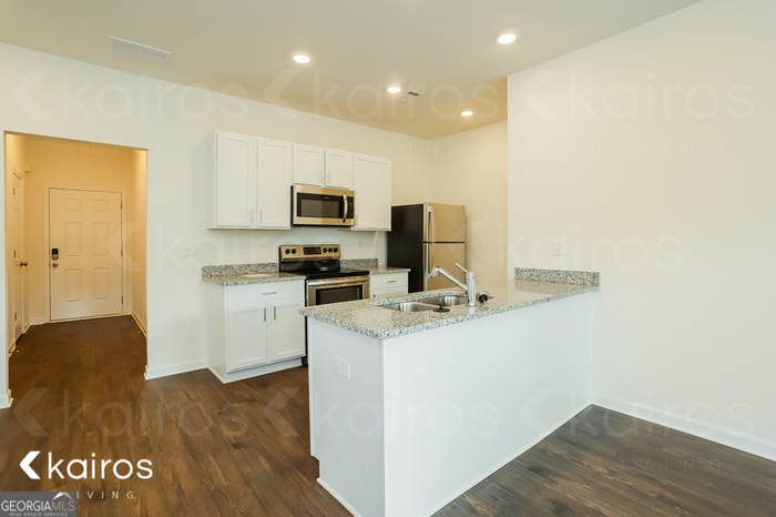 115 Dudley Way Southwest Cartersville, GA 30120 - Photo 7 of 16 a view of kitchen with wooden floor