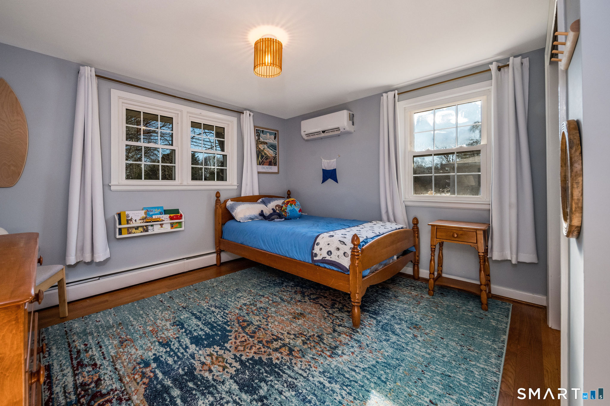 99 Maple Avenue Old Saybrook, CT 06475 - Photo 15 of 30 a bedroom with a bed and a window