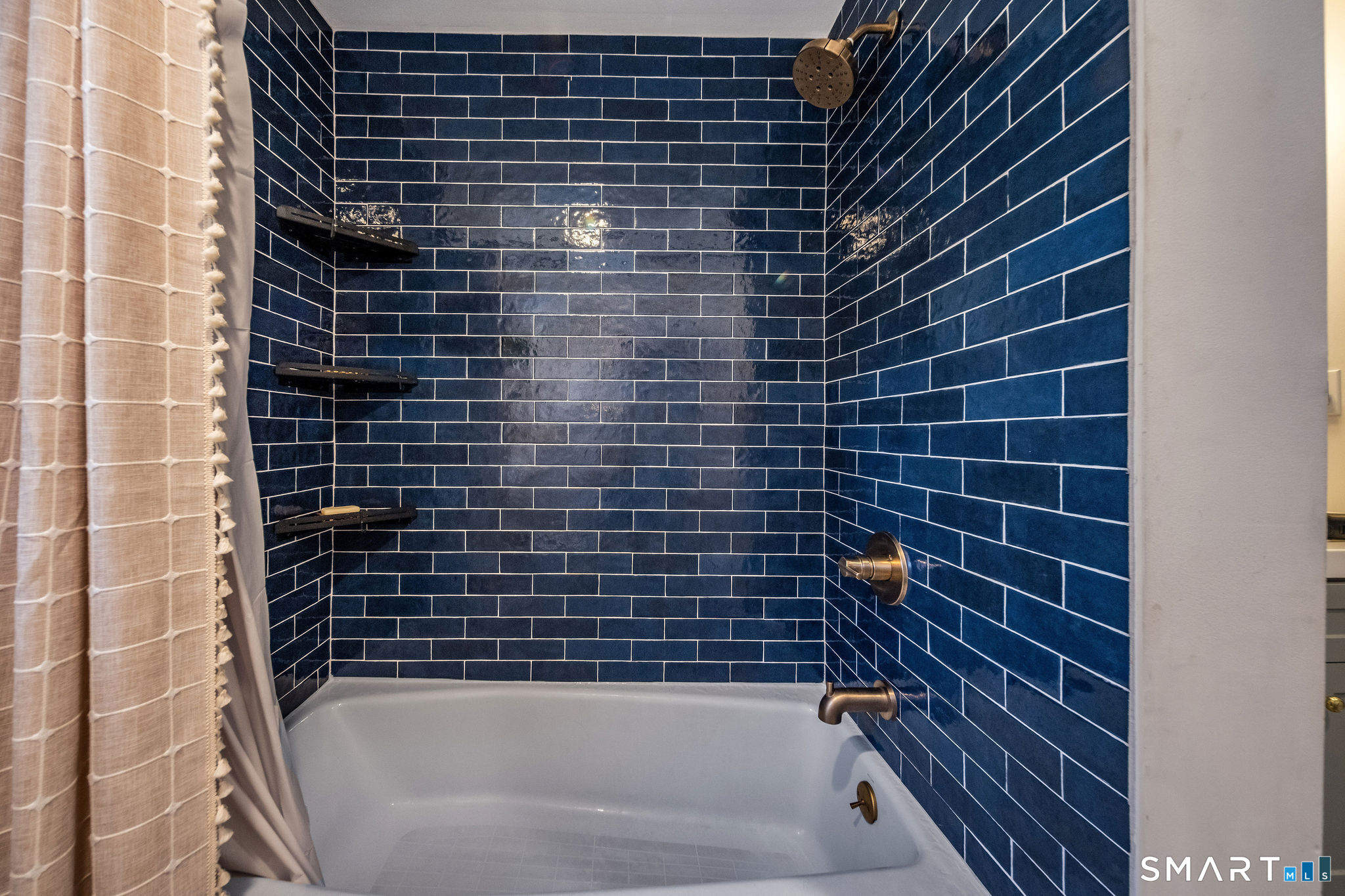 99 Maple Avenue Old Saybrook, CT 06475 - Photo 17 of 30 a bathroom with a bathtub