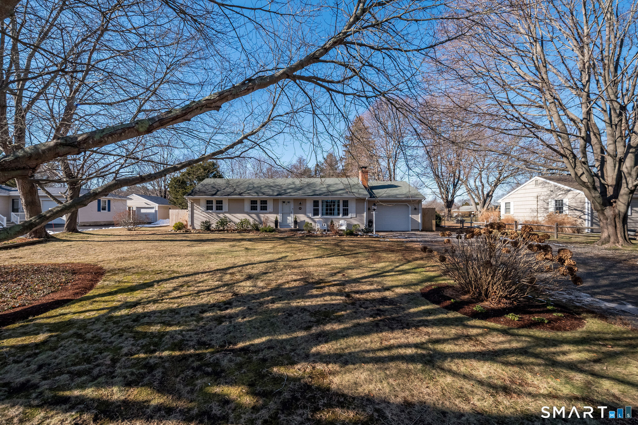 99 Maple Avenue Old Saybrook, CT 06475 - Photo 2 of 30 a view of a house with a big yard