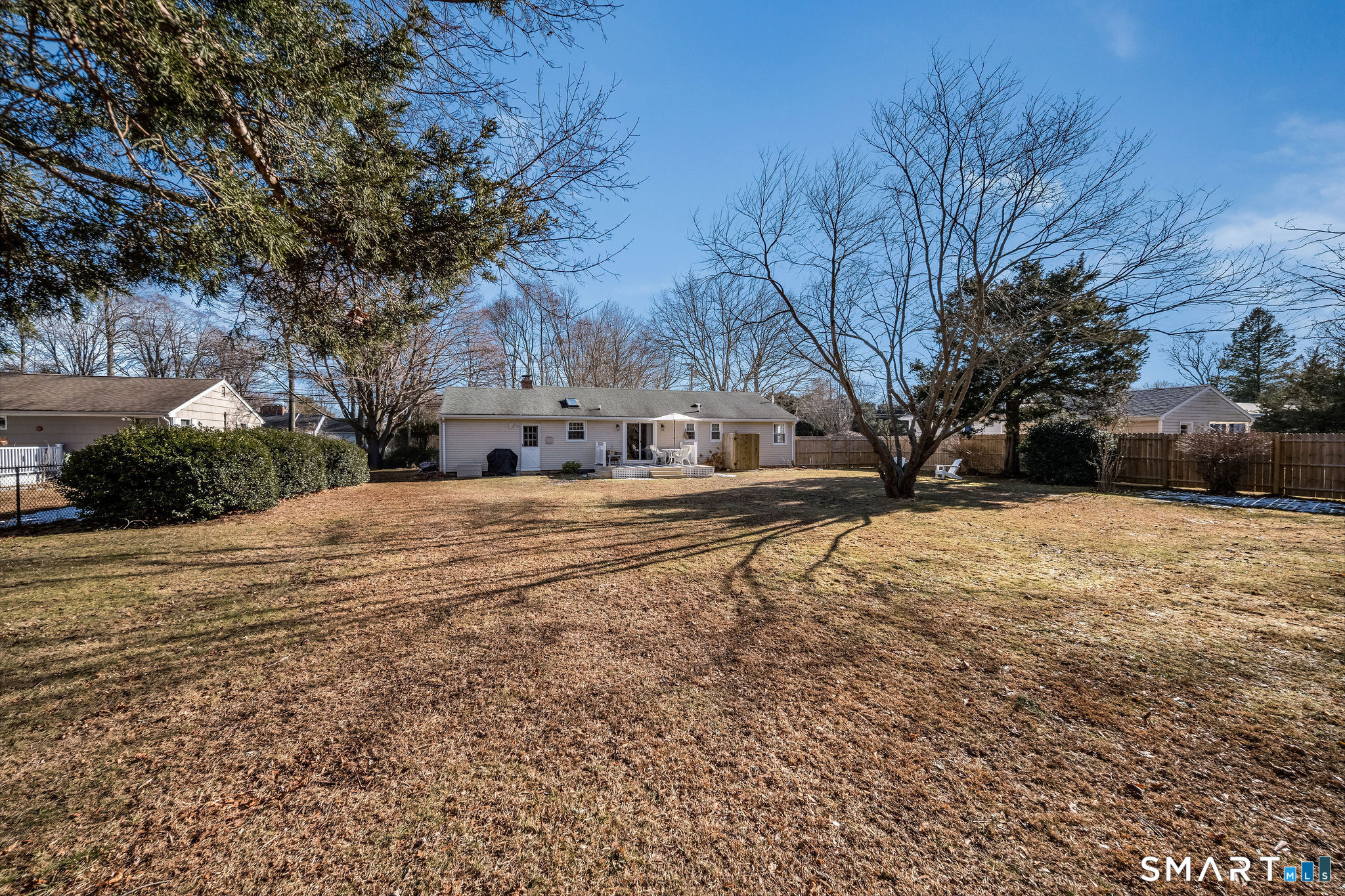 99 Maple Avenue Old Saybrook, CT 06475 - Photo 22 of 30 a view of road with large trees