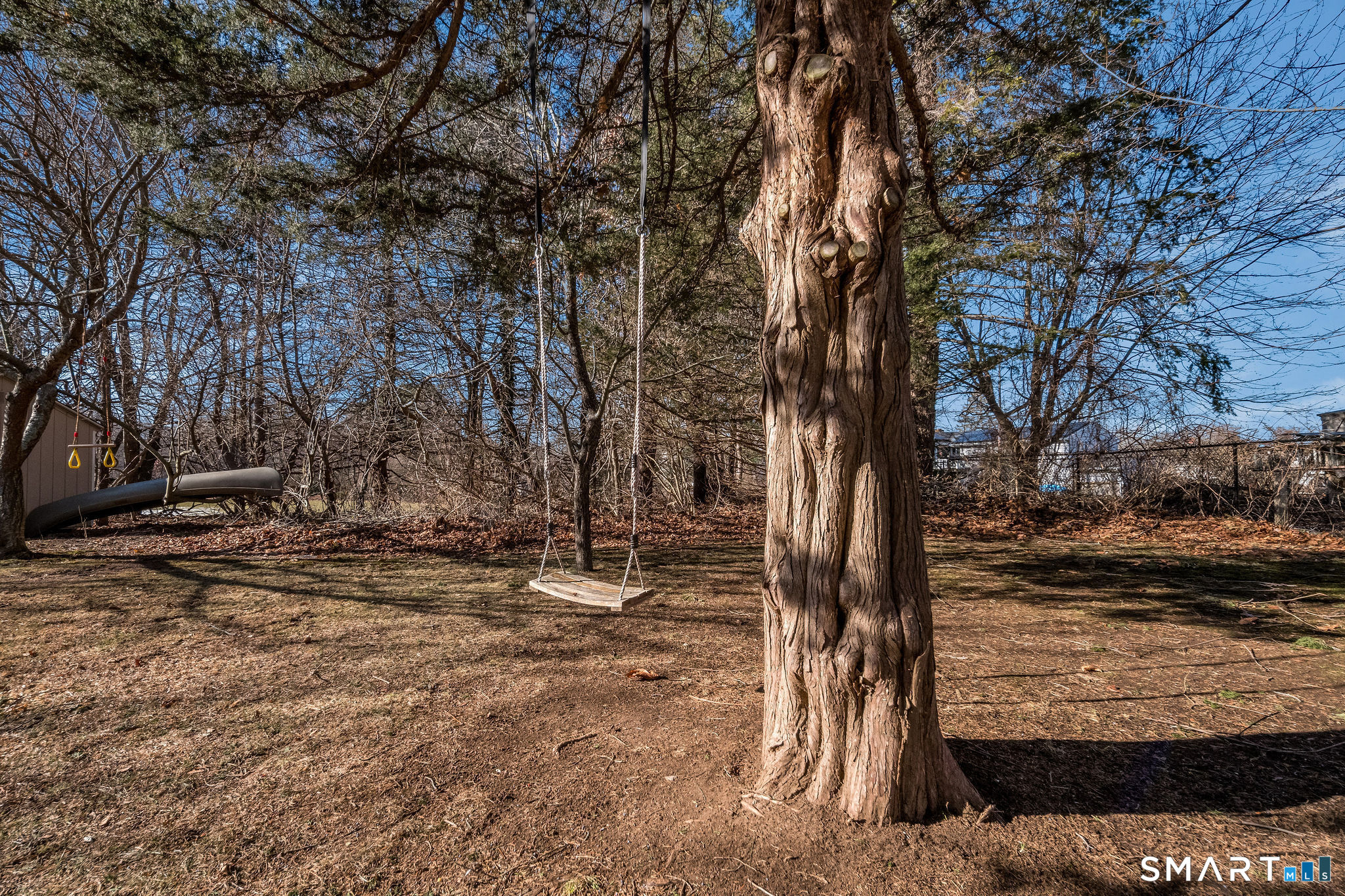 99 Maple Avenue Old Saybrook, CT 06475 - Photo 24 of 30 a view of a yard with trees