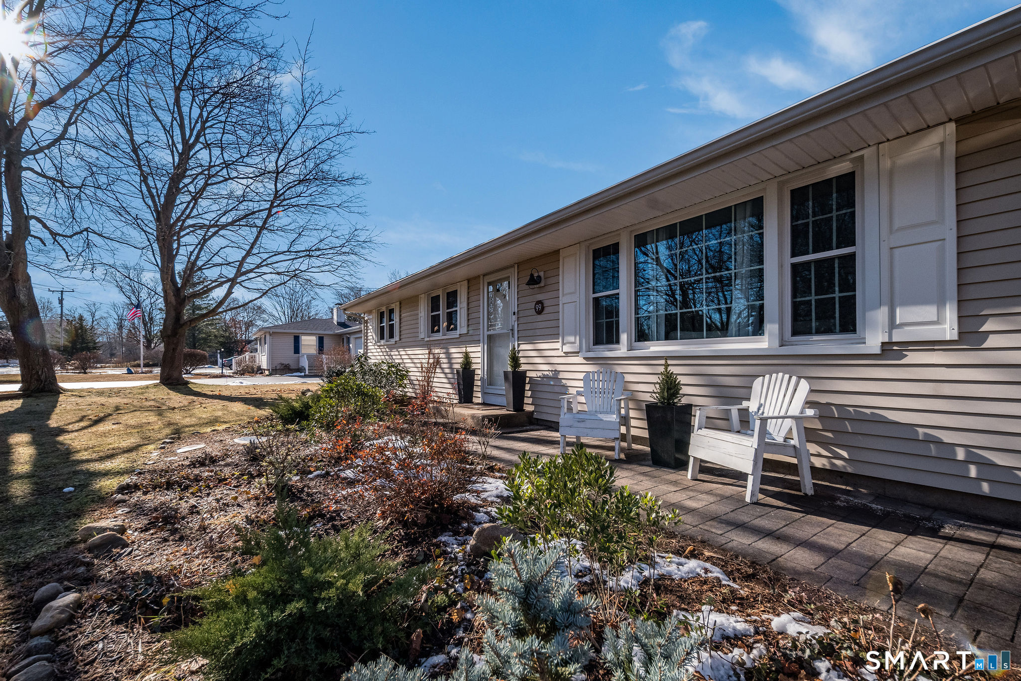 99 Maple Avenue Old Saybrook, CT 06475 - Photo 3 of 30 a front view of a house with garden