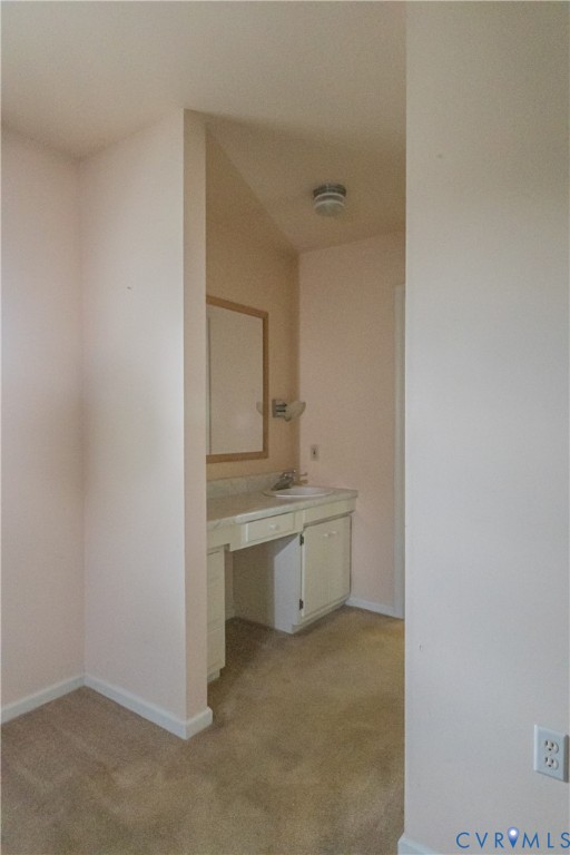 309 Old Plank Road Kenbridge, VA 23944 - Photo 40 of 45 Vanity with a built-in sink, wall-mounted mirror,