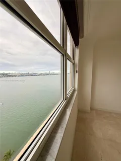 a view of balcony with ocean