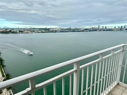 a view of a lake with a city view