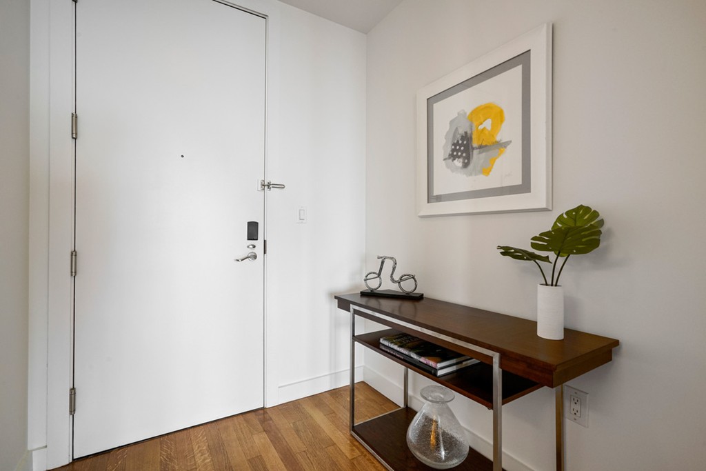 400 Stuart Street, Unit 29C Boston, MA 02116 - Photo 16 of 16 a view of kitchen cabinetry and wooden floor