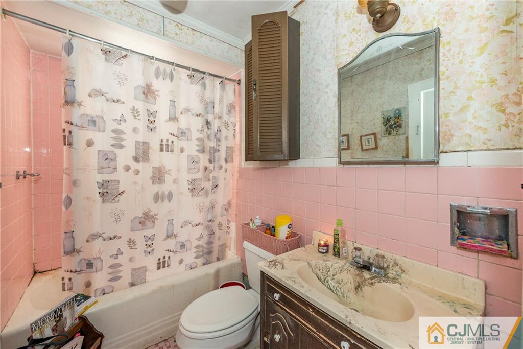 65 Ford Road Howell, NJ 07731 - Photo 13 of 22 a bathroom with a sink toilet and shower