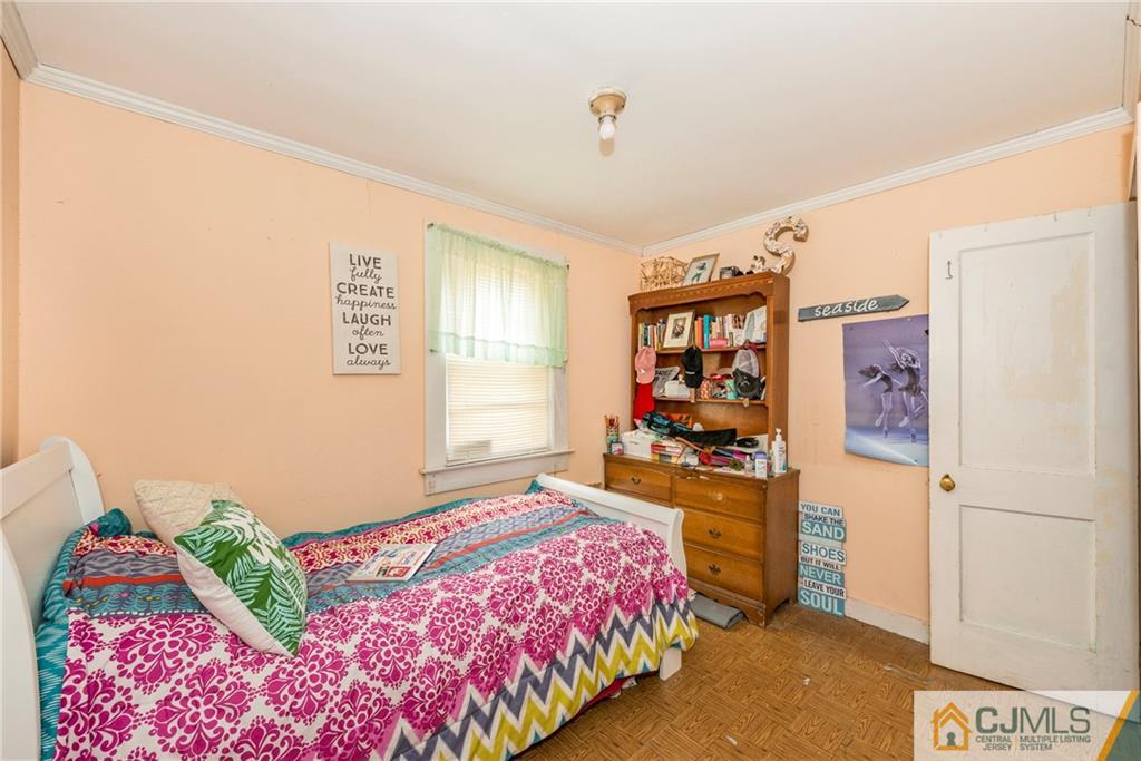 65 Ford Road Howell, NJ 07731 - Photo 14 of 22 a bedroom with a bed and a window