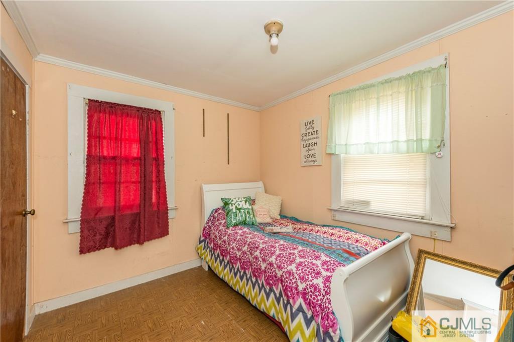 65 Ford Road Howell, NJ 07731 - Photo 15 of 22 a bedroom with a bed and a window