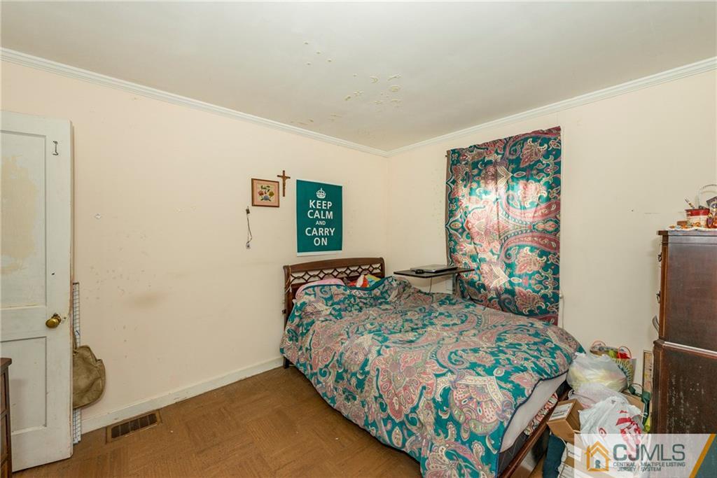 65 Ford Road Howell, NJ 07731 - Photo 16 of 22 a bedroom with bed and a window