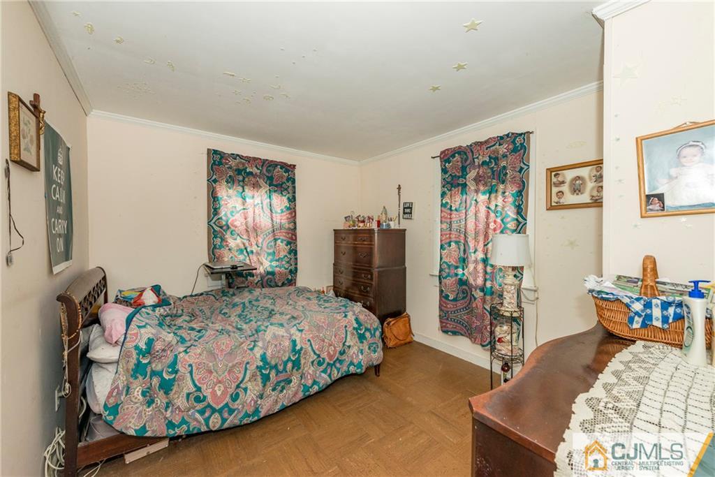 65 Ford Road Howell, NJ 07731 - Photo 17 of 22 a bedroom with bed and a window