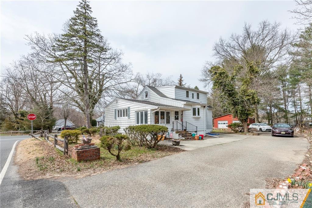 65 Ford Road Howell, NJ 07731 - Photo 20 of 22 a view of a street with cars