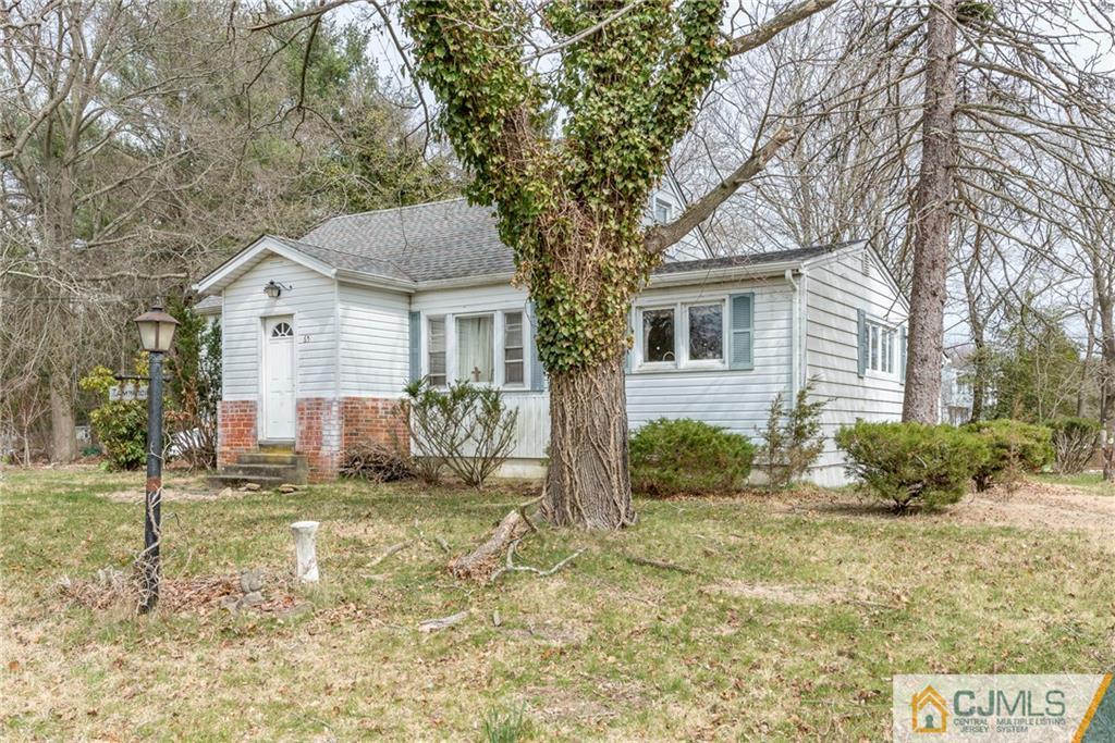 65 Ford Road Howell, NJ 07731 - Photo 21 of 22 a front view of a house with a yard