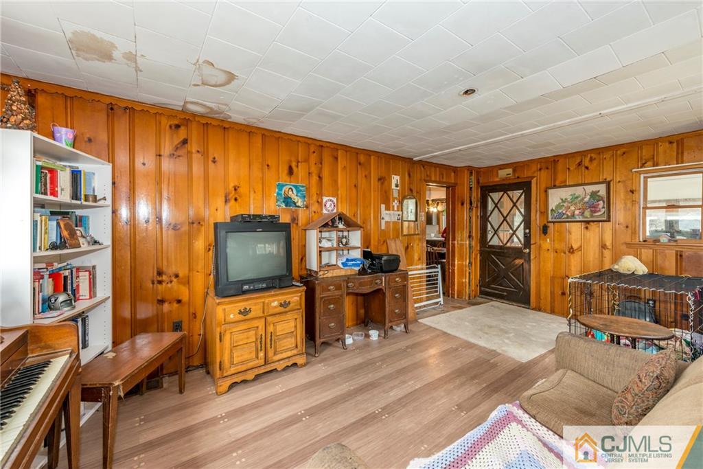 65 Ford Road Howell, NJ 07731 - Photo 5 of 22 a living room with furniture and a flat screen tv