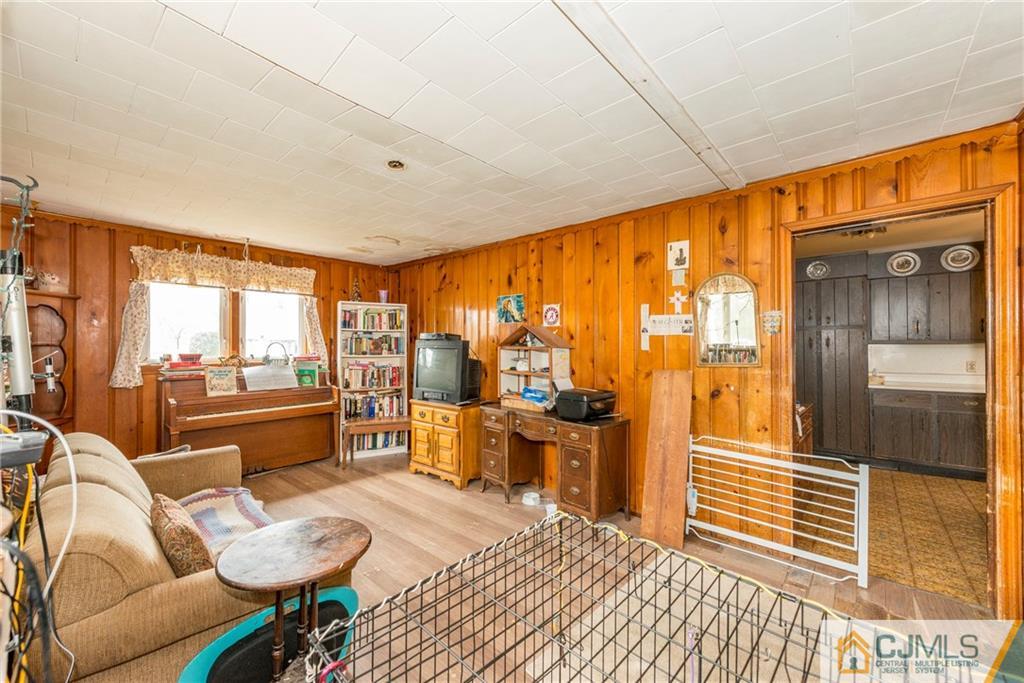 65 Ford Road Howell, NJ 07731 - Photo 6 of 22 a bedroom with furniture and large windows