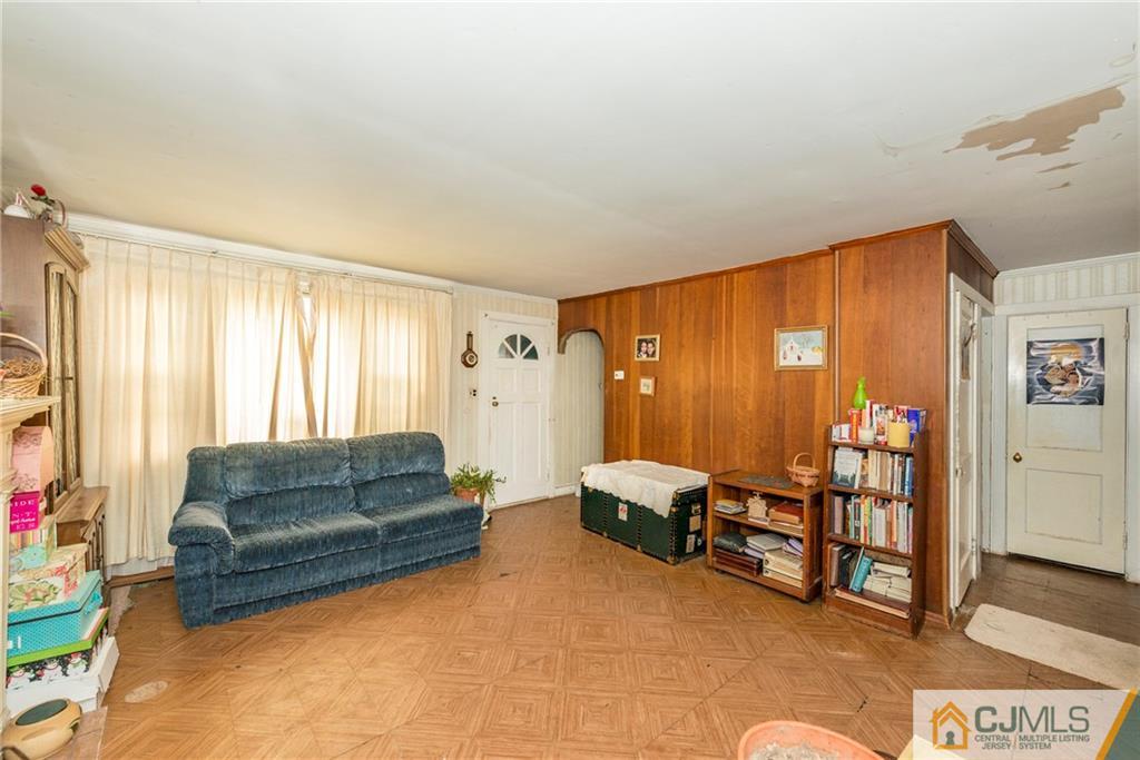 65 Ford Road Howell, NJ 07731 - Photo 9 of 22 a living room with furniture and a window
