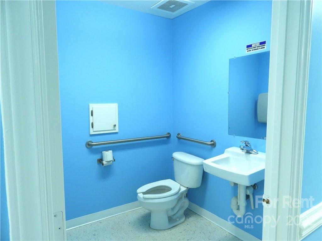 327 West College Avenue Boiling Springs, NC 28152 - Photo 19 of 24 a bathroom with a sink and a toilet