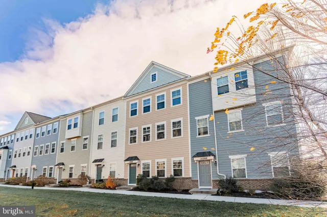 a view of a building with a yard