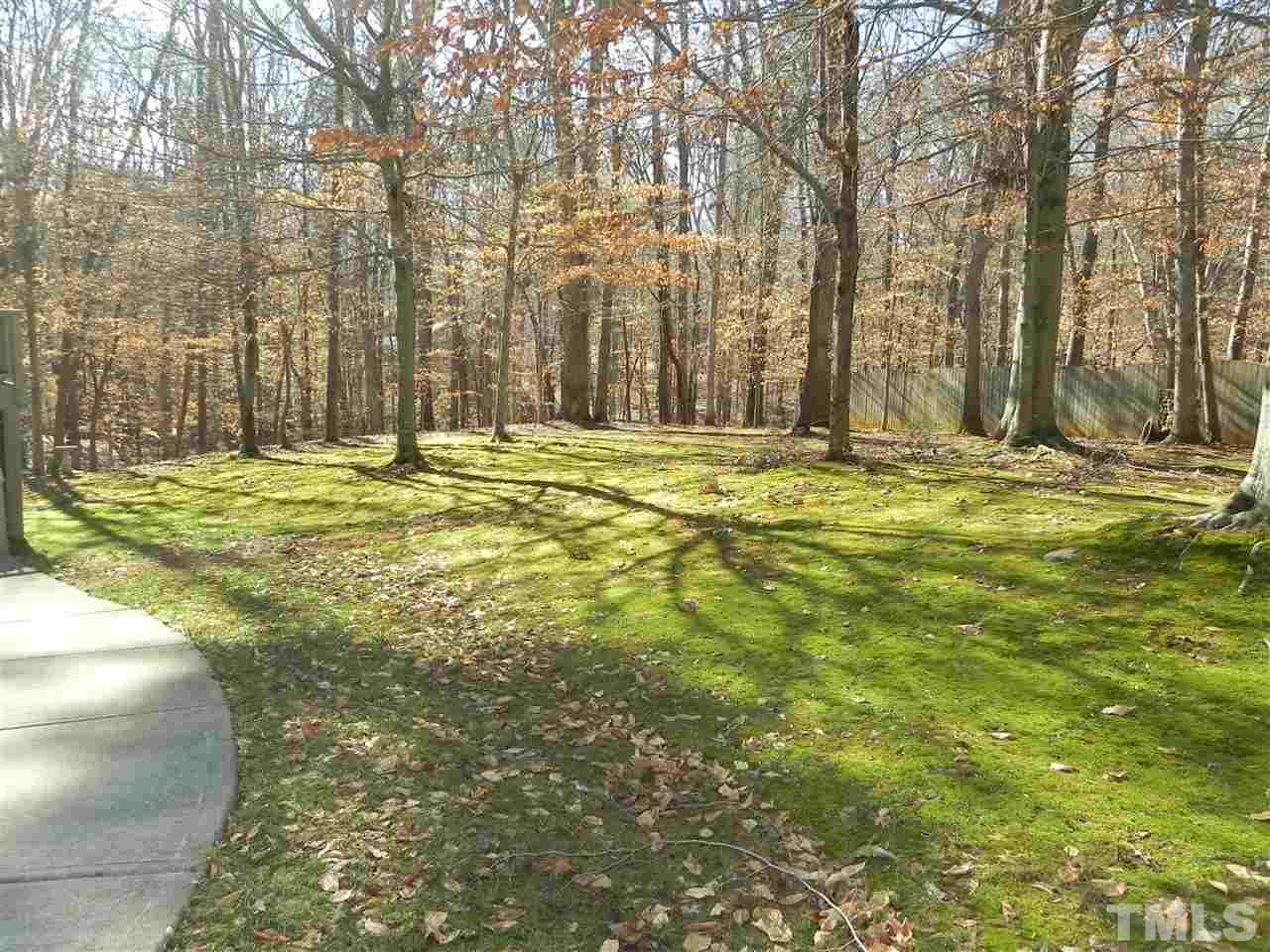 5505 Overleaf Court Raleigh, NC 27615 - Photo 23 of 25 The Backyard is Like a Park w/Tons of Trees and Plenty of Room to Run and Play. Truly a Beautiful Setting!