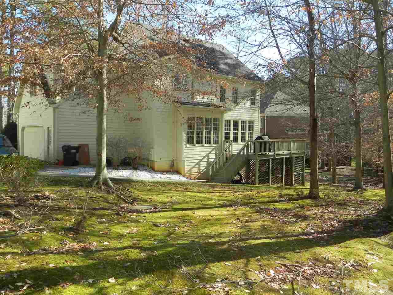 5505 Overleaf Court Raleigh, NC 27615 - Photo 24 of 25 2 Car Side Entry Garage w/Service Door, Loads of Windows to Bring the Natural Light Indoors, and a Gorgeous Backyard w/Deck Off the Back and Patio Off the Side - What Are You Waiting For? 5505 Overleaf is Waiting for You!