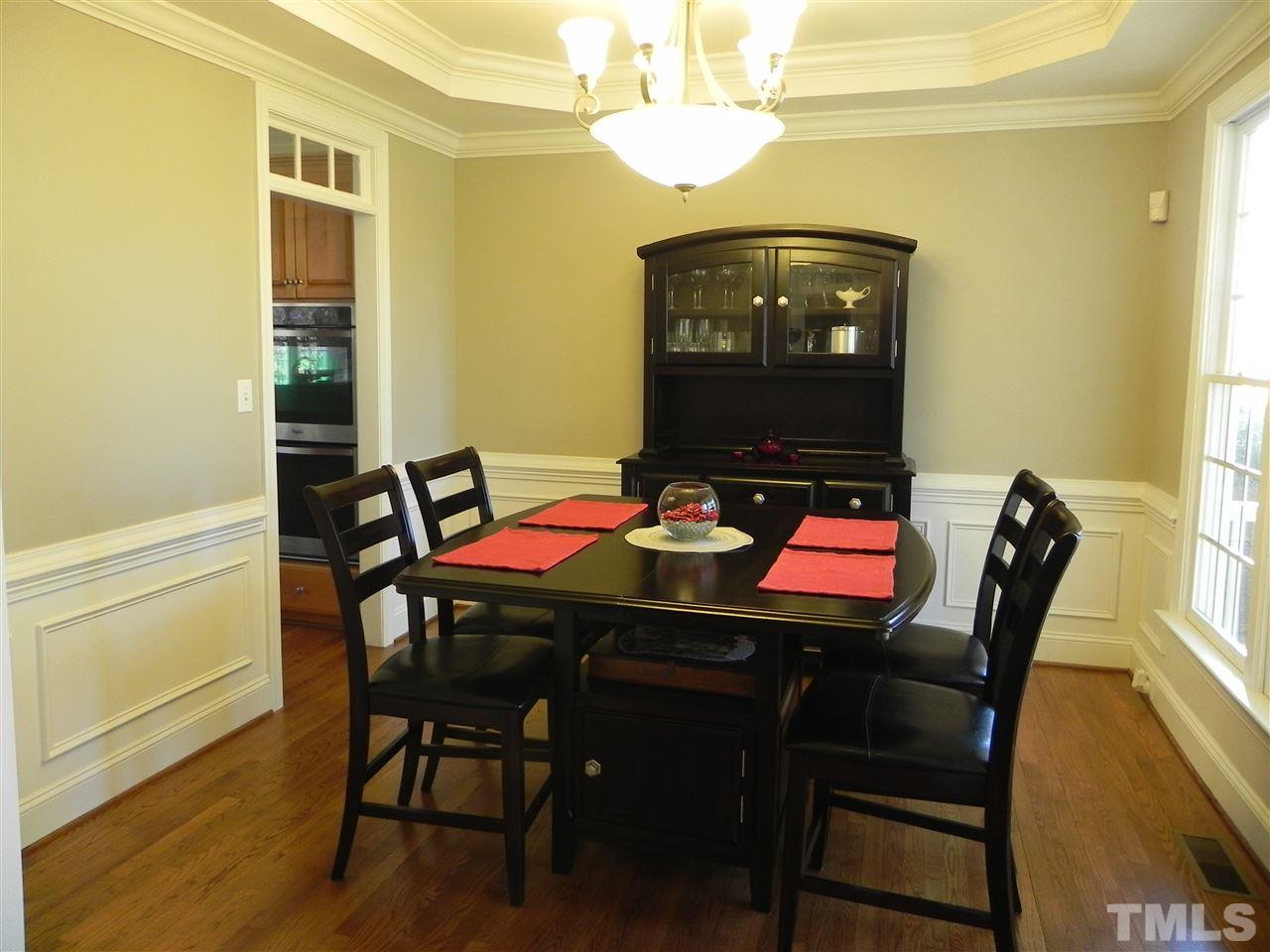 5505 Overleaf Court Raleigh, NC 27615 - Photo 5 of 25 With a Large Window Overlooking the Spacious Front Yard, The Dining Room is Warm and Inviting