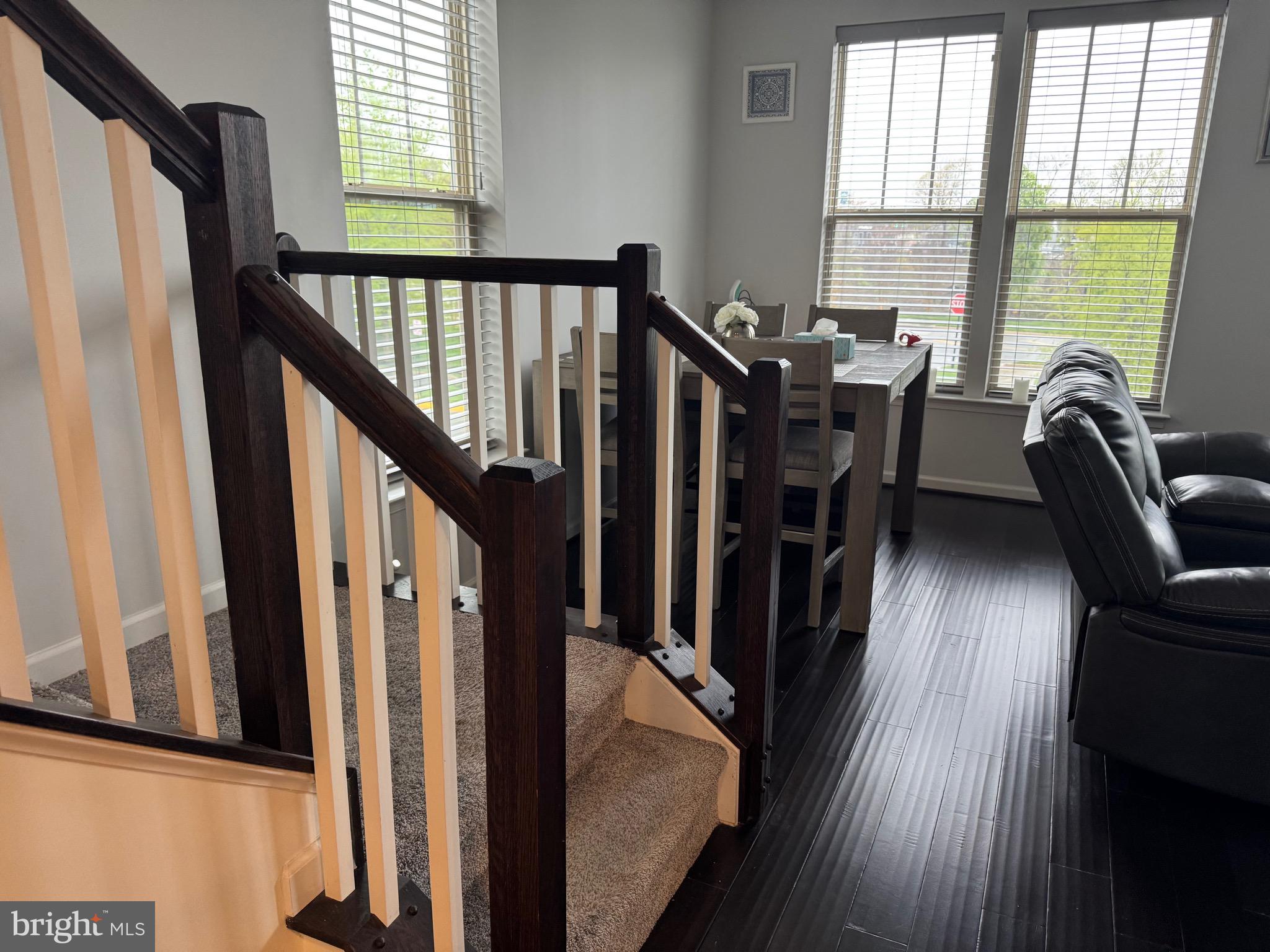 8937 Garrett Way Manassas, VA 20112 - Photo 19 of 66 a view of a hallway with furniture and stairs