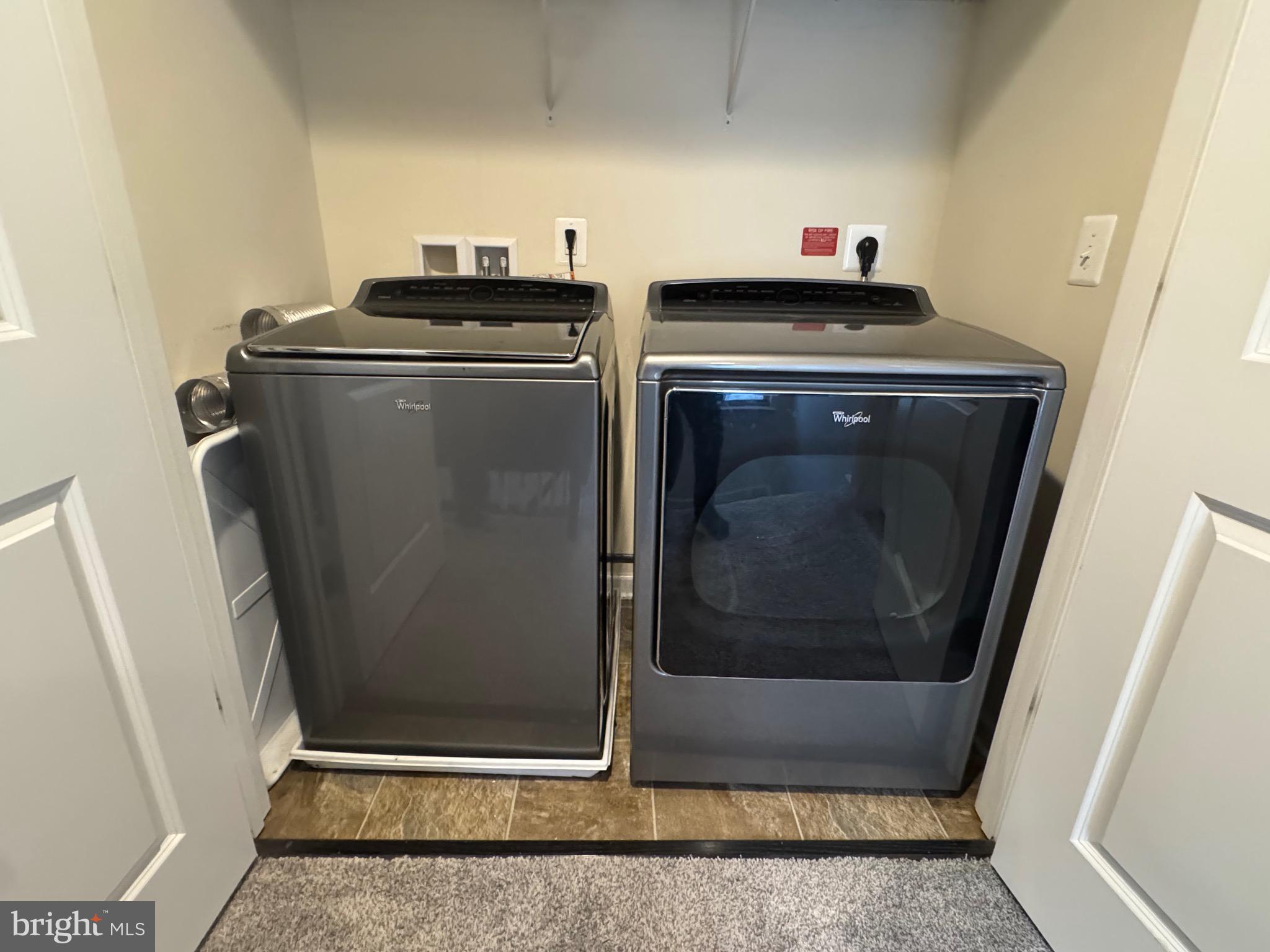 8937 Garrett Way Manassas, VA 20112 - Photo 34 of 66 a view of washer and dryer