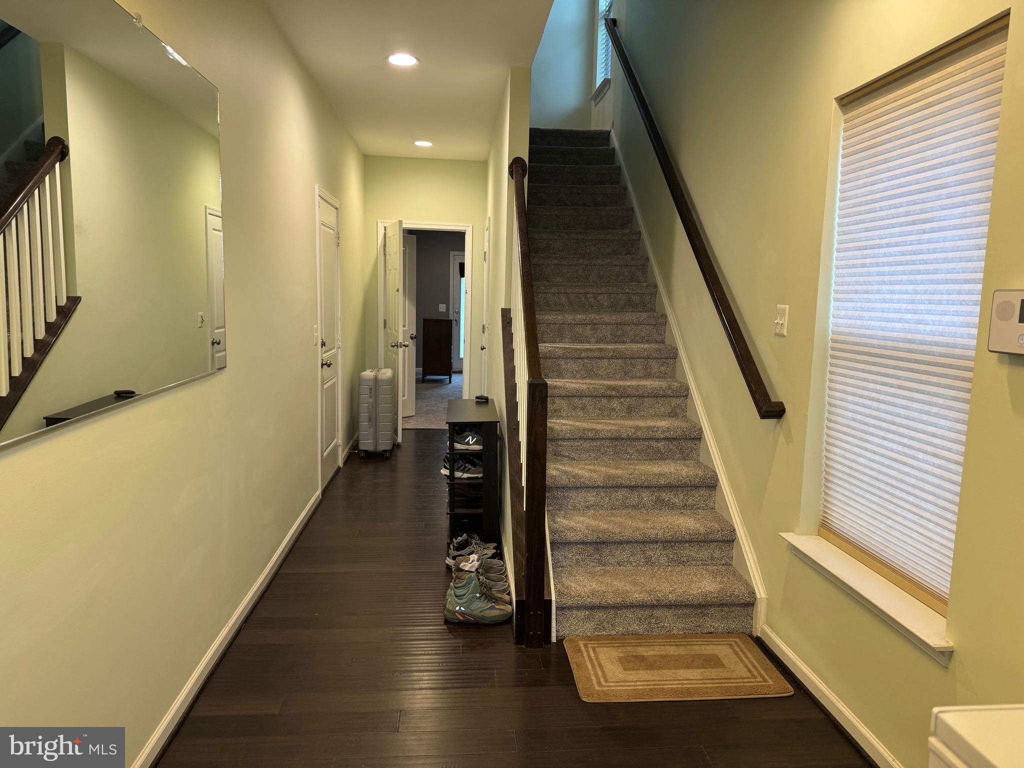 8937 Garrett Way Manassas, VA 20112 - Photo 4 of 66 a view of a hallway with staircase