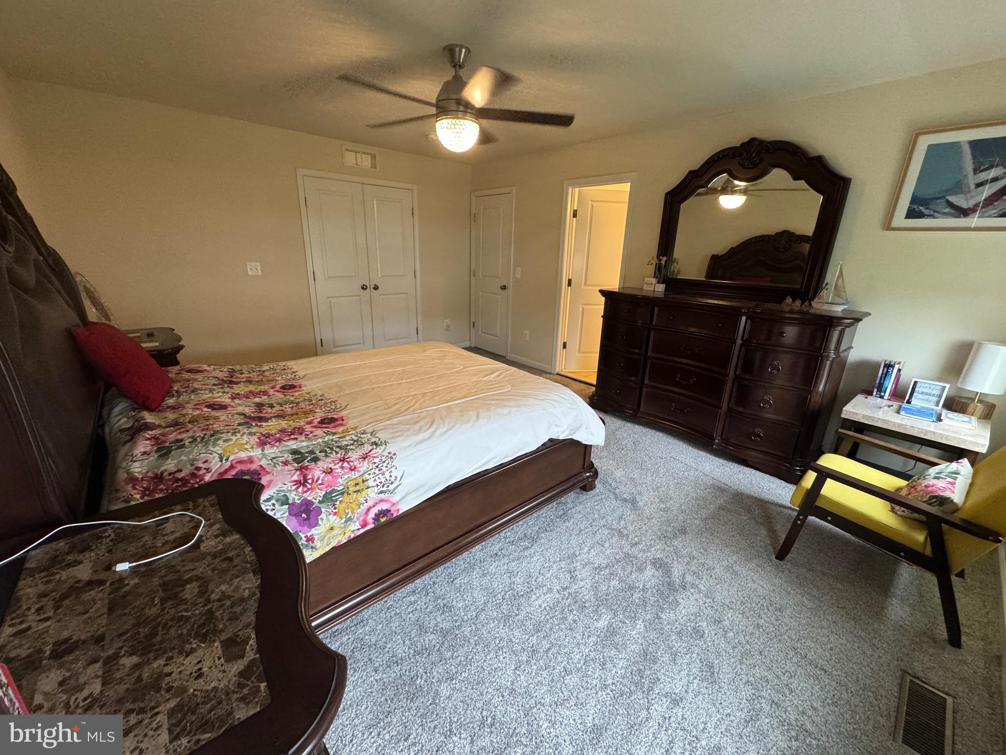 8937 Garrett Way Manassas, VA 20112 - Photo 42 of 66 a bed room with a bed window and dresser