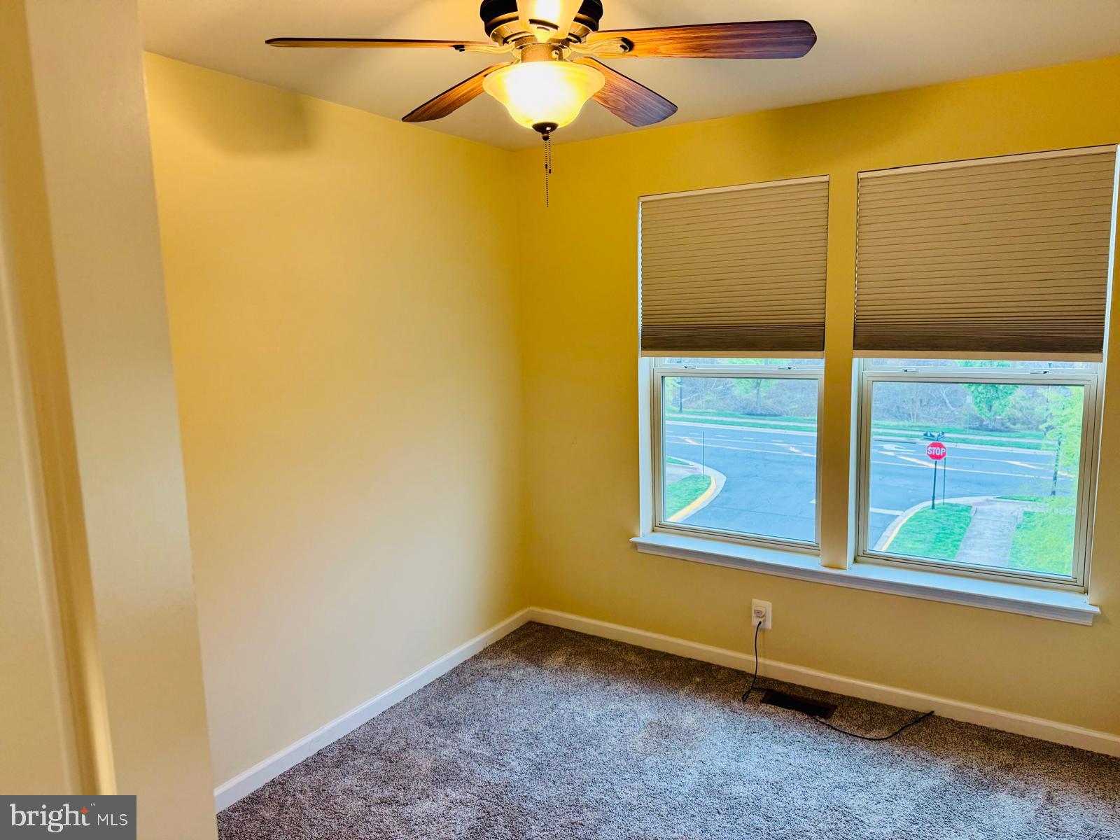8937 Garrett Way Manassas, VA 20112 - Photo 51 of 66 a view of a room with window and a ceiling fan