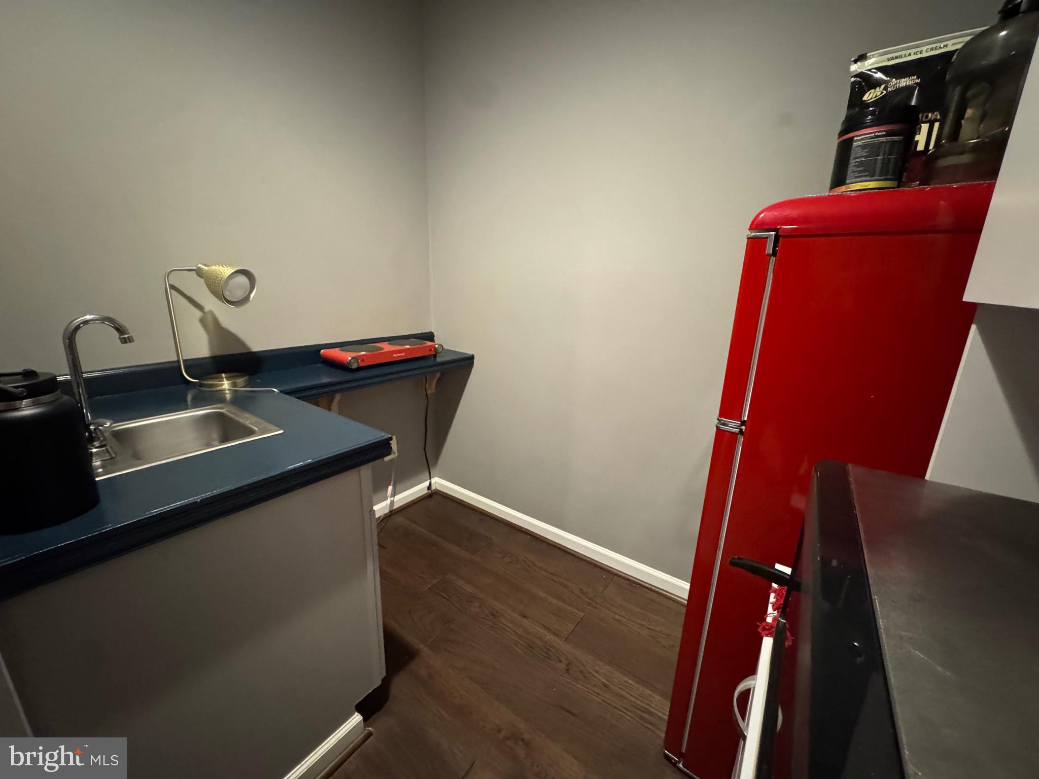 8937 Garrett Way Manassas, VA 20112 - Photo 54 of 66 a bathroom with a sink and a mirror
