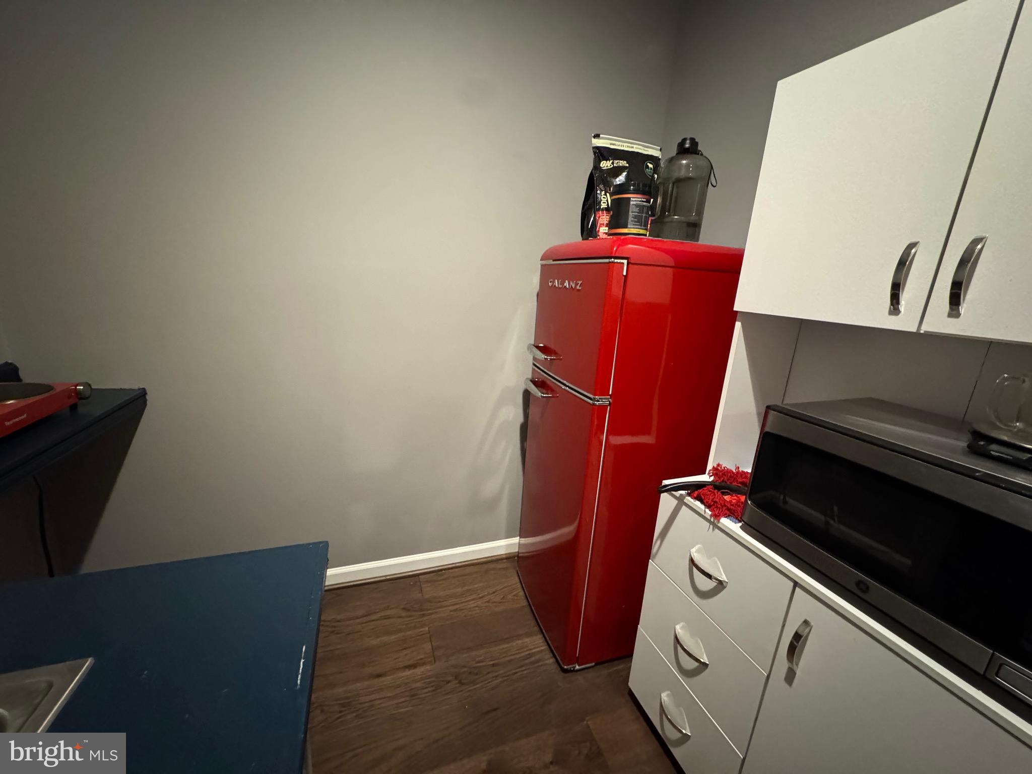 8937 Garrett Way Manassas, VA 20112 - Photo 57 of 66 a room with storage and utility