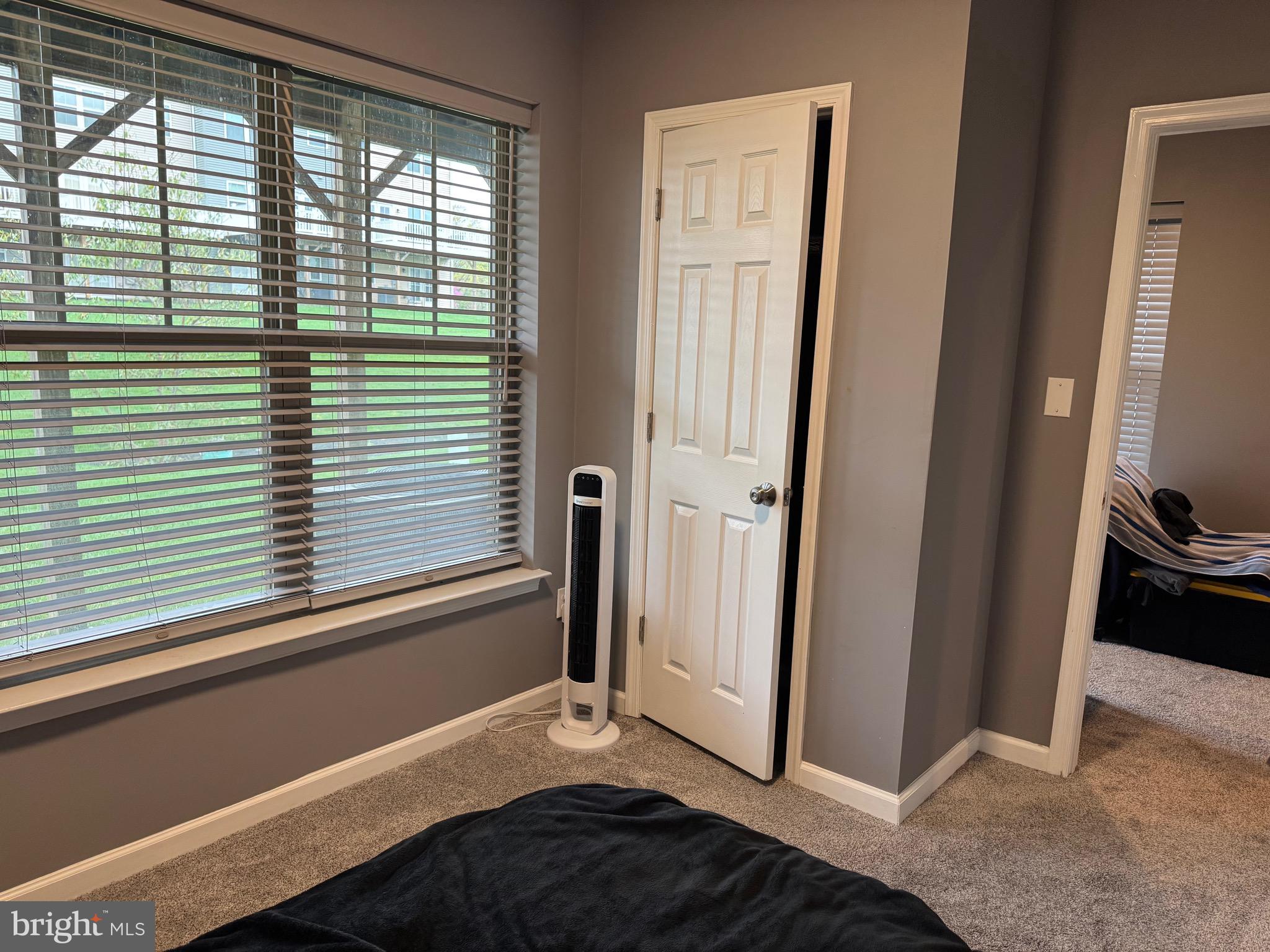 8937 Garrett Way Manassas, VA 20112 - Photo 58 of 66 a view of a bedroom with window
