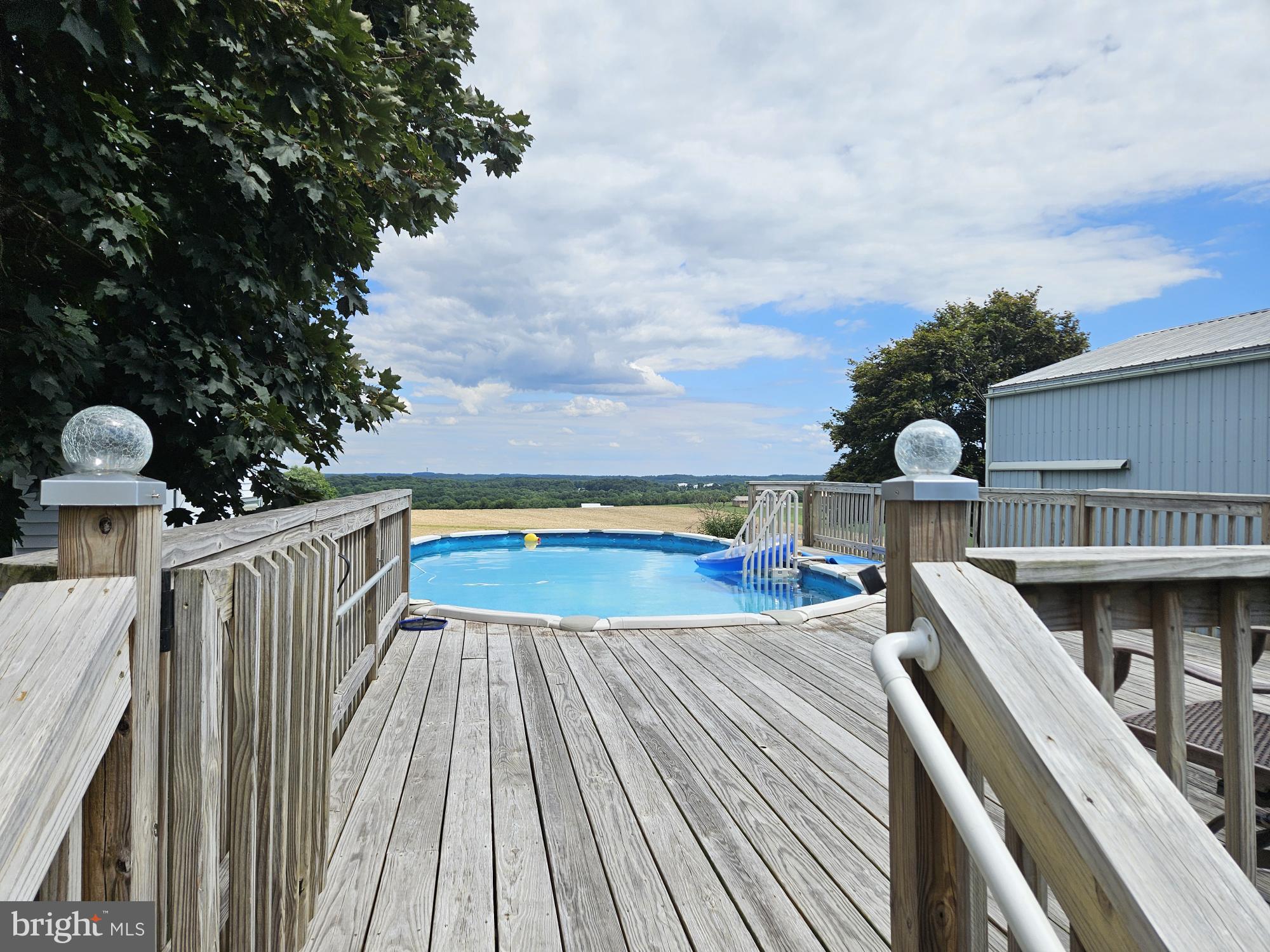 7015 Woodbine Road Woodbine, MD 21797 - Photo 11 of 60 Decking and pool