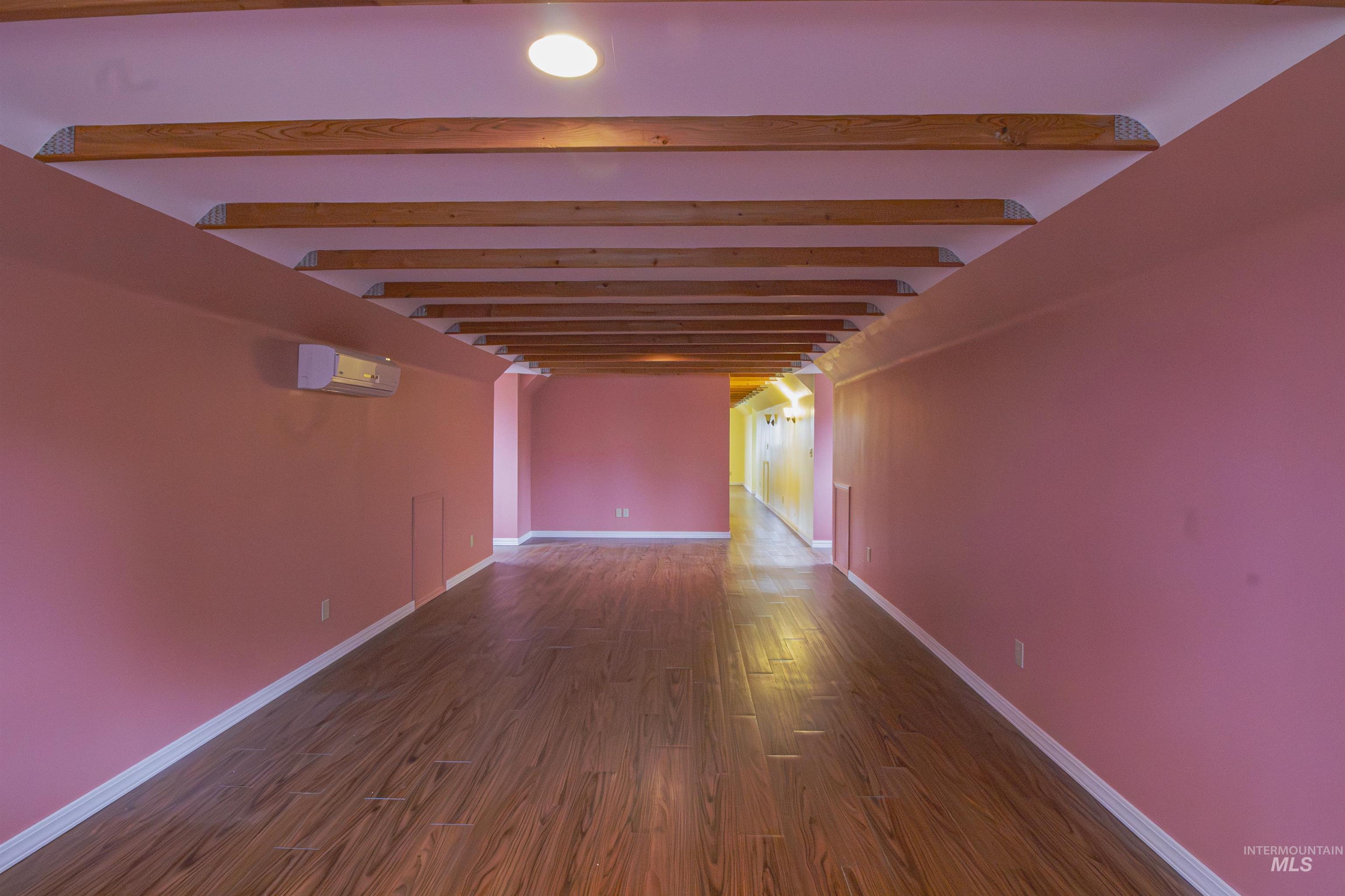 2465 Center Avenue Payette, ID 83661 - Photo 24 of 39 Family room with dark wood-style flooring and baseboards